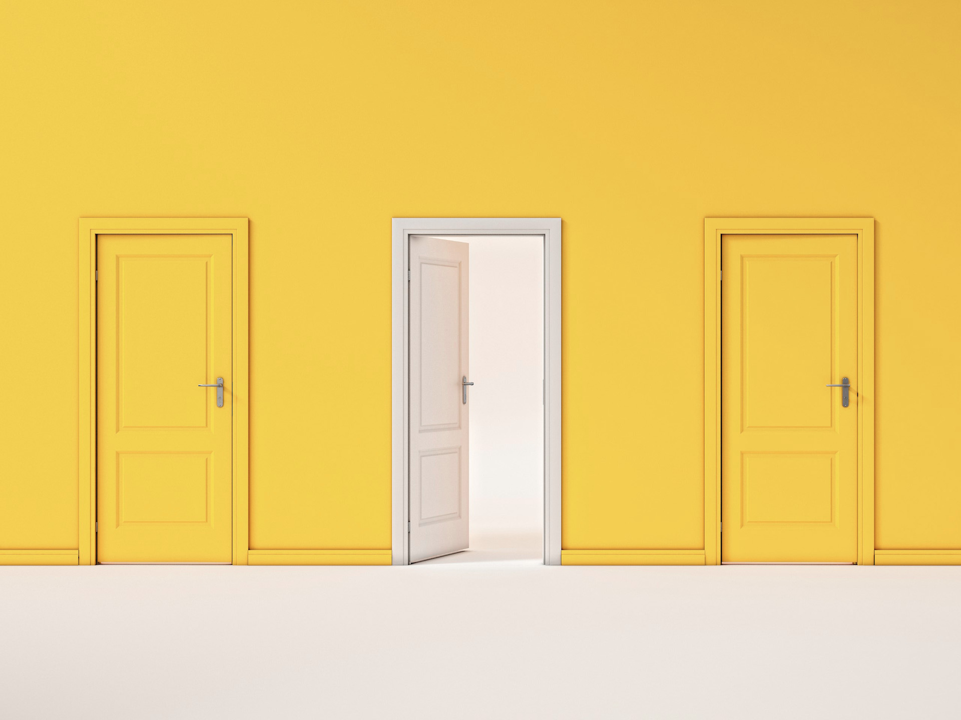An open white door between two closed yellow doors.